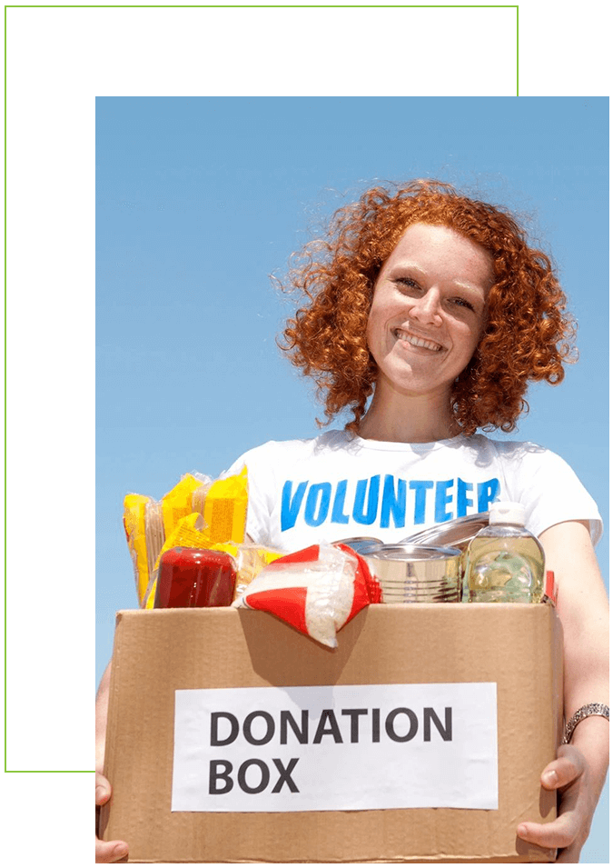 Happy, smiling volunteer with donation box