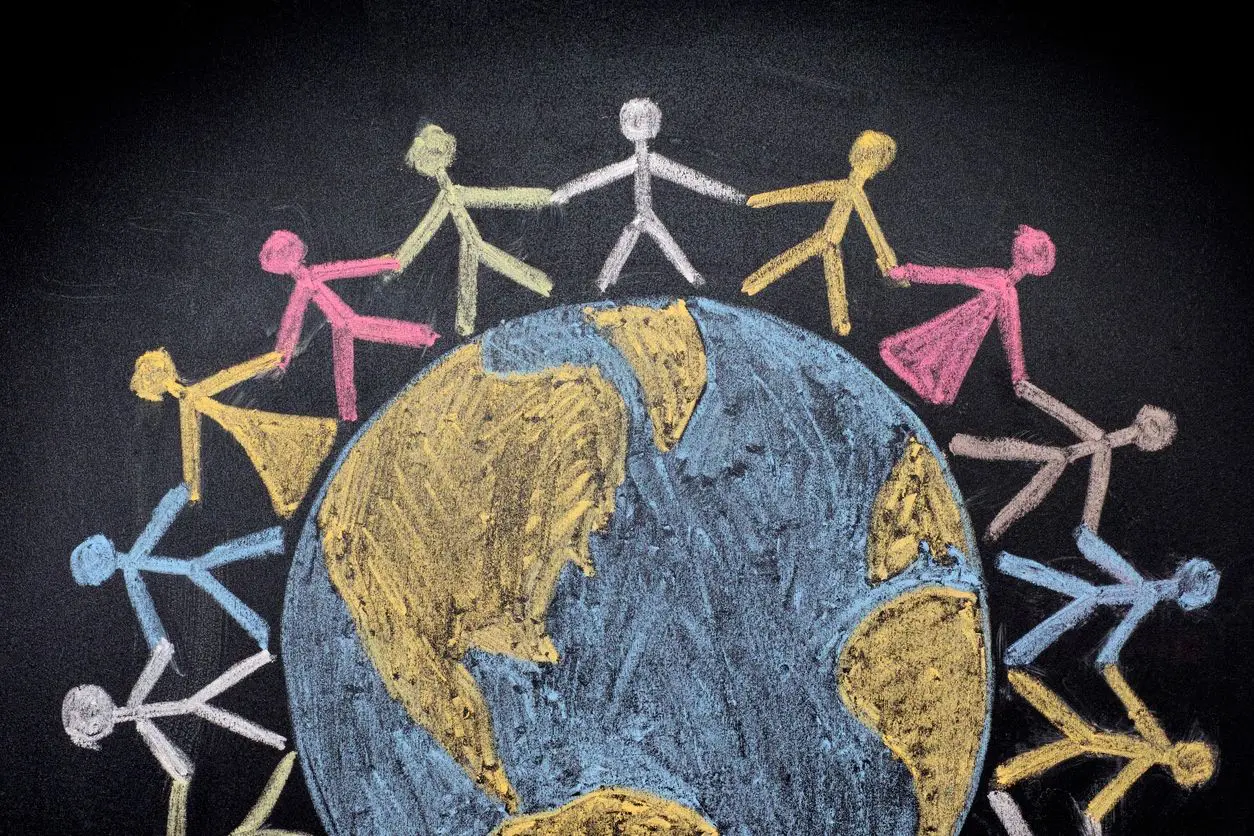 Group of people around the world. Chalk drawing.